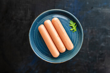 sausage meat pork, beef or chicken on the table healthy meal snack ingredient top view copy space...