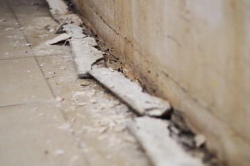 the building wall damaged by moisture and water, water and moisture on the walls of the building,