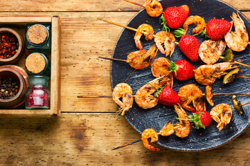 Grilled shrimps on skewers with strawberries,BBQ shrimp