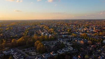 Foto auf Alu-Dibond Drone photo of Bennekom, Gelderland. This photo is taken at sunset, the village is near to ede. Drone foto van bennekom, Gelderland. Zonsondergang van een dorp dicht bij ede. © Sjoerd