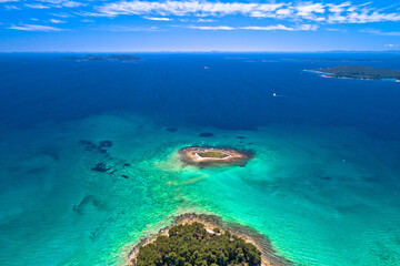 Fototapeta na wymiar Crvena Luka turquoise beach and archipelago of Adriatic sea aerial view