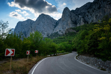 asphalted road in the mountains, beautiful sunshine, summer vacation time