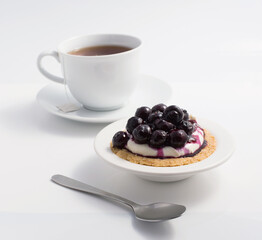blueberries cheese pie and coffee