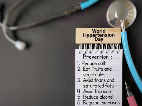 Healthcare Awareness Concept - World hypertension day with prevention measures text background. Stock photo. - Powered by Adobe
