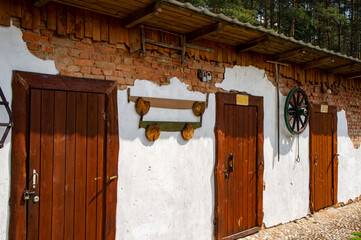 Old wooden vintage door. Entrance to the building. Avgustov, Belarus, 17 May 2021