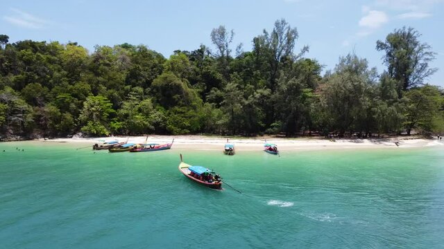 Aerial drone shot.  Boat come to island