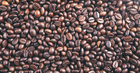 Coffee beans background. Dark coffee background