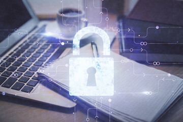 Double exposure of lock drawing and desktop with coffee and items on table background. Concept of...