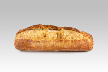Mini baguette with a crisp golden crust, on a light background