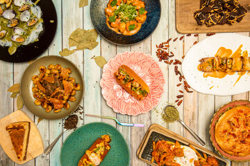 top view of Spanish fusion dishes with mussels and curry sauce, clams and Chinese noodles