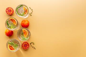 Sangria drink with blood orange grapefruit and rosemary. Top view