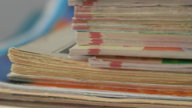 Closeup macro view of stack of old vintage magazines