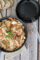 Rice pasta with vegetables and meat.