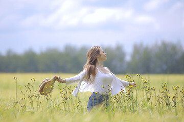 nature autumn field fashion model girl / landscape in summer field beautiful young happy model...