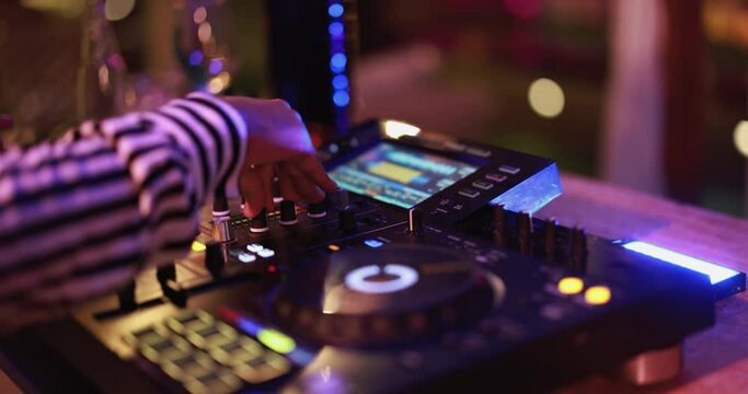 Black Dj playing music at cocktail bar outdoor - Entertainment and party concept