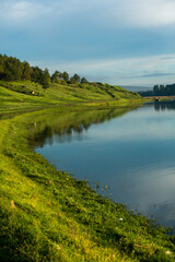 Beautiful Landscape with lake and trees. Amazing Nature in Europe. Lovely place to visit this summer.