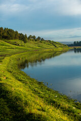 Beautiful Landscape with lake and trees. Amazing Nature in Europe. Lovely place to visit this summer.