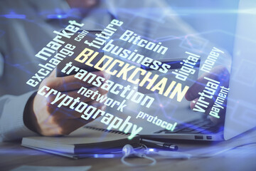 Double exposure of man hands holding a credit card and crypto business theme drawing. Digital blockchain and E-commerce concept.