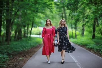 Fototapeta premium springtime female portrait city, fresh spring look in city street outside young woman