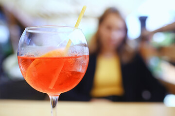 springtime female portrait city, fresh spring look in city street outside young woman