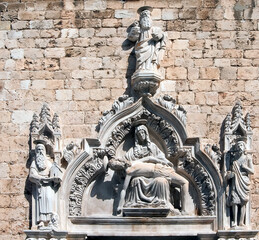 Carved portal from 1498 of Franciscan friary and church in Dubrovnik, Croatia