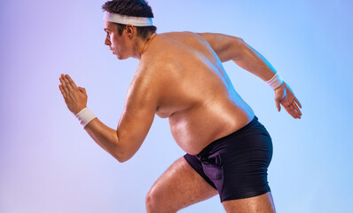 Running sport man. A very fat man jogging to lose weight and become a slim athlete.