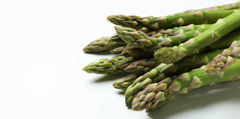 Fresh green asparagus on white background, close up