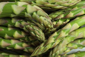 Bunch of fresh green asparagus, close up