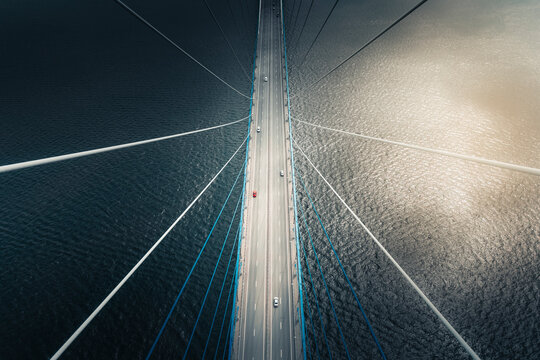 Fototapeta Aerial view of vehicles crossing the Russkiy Most, the main bridge in Vladivostok, Russia.