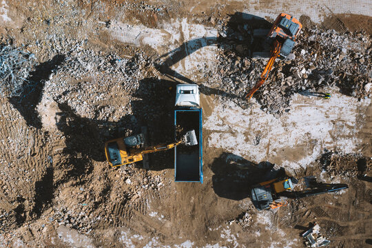 Aerial view of old building demolition work process in construction site in Kaunas city, Lithuania.