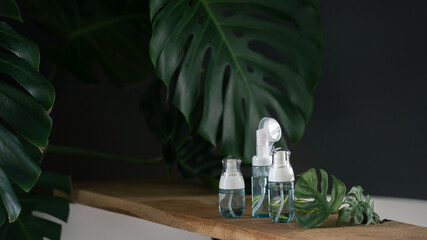 Plastic bottles with serum and skin care cosmetics