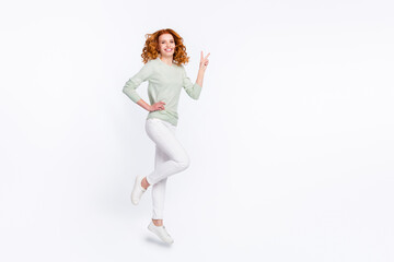 Fototapeta premium Full length body size photo young woman red hair jumping high showing v-sign isolated white color background