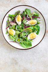 fresh summer salad egg vegetables green leaves mix spinach, arugula, lettuce wholesome food healthy meal snack copy space food background top view veggie vegetarian