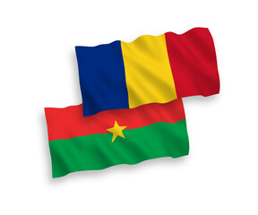 Fototapeta premium National vector fabric wave flags of Romania and Burkina Faso isolated on white background. 1 to 2 proportion.