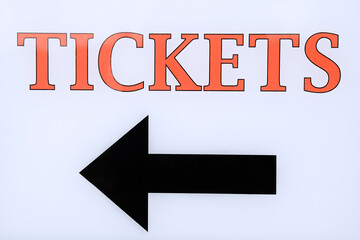 Sign with direction arrow to ticket sales