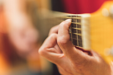 Fototapeta premium Person playing a classical guitar