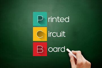 PCB - Printed Circuit Board acronym, technology concept background on blackboard