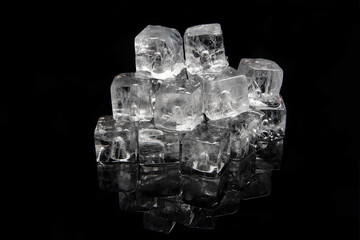 Ice cubes for cocktails on black background