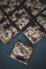 Tasty vegetarian brownie made from chocolate and cacao. Delicious chocolate pie. Selective focus....