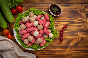 hot dog or sausages on the dark wooden background.
