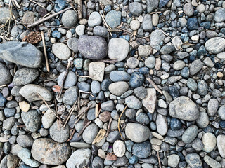 pebble stones background on the river.