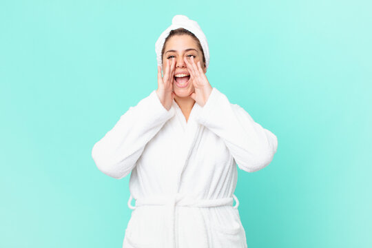 curvy pretty woman after a shower wearing bathrobe