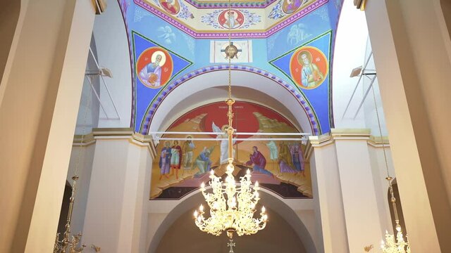 A mural in the church. Biblical images on the ceiling. Orthodox architecture
