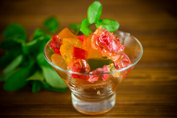 colored sweet fruit jelly in a glass glass