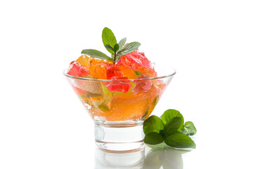 colored sweet fruit jelly in a glass glass