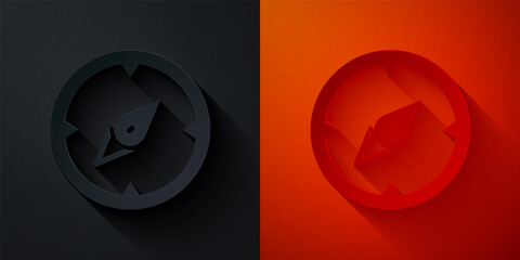 Paper cut Compass icon isolated on black and red background. Windrose navigation symbol. Wind rose sign. Paper art style. Vector