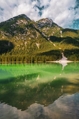 Fototapeta premium Panoramic view of Lake Dobbiaco ( Toblacher See ) in the Dolomites, Italy.
