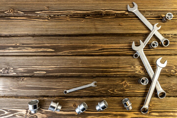 Happy Father's Day. Flat lay with Copy Space on Father's Day theme. Wooden background. On the topic of car mechanic and motorcyclist, biker