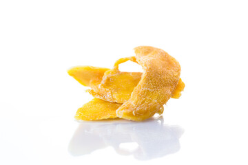 slices of sweet ripe dried mango on white background