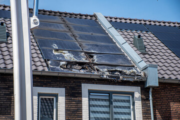burned solar panels on roof